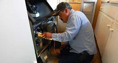 Man working on refrigeration